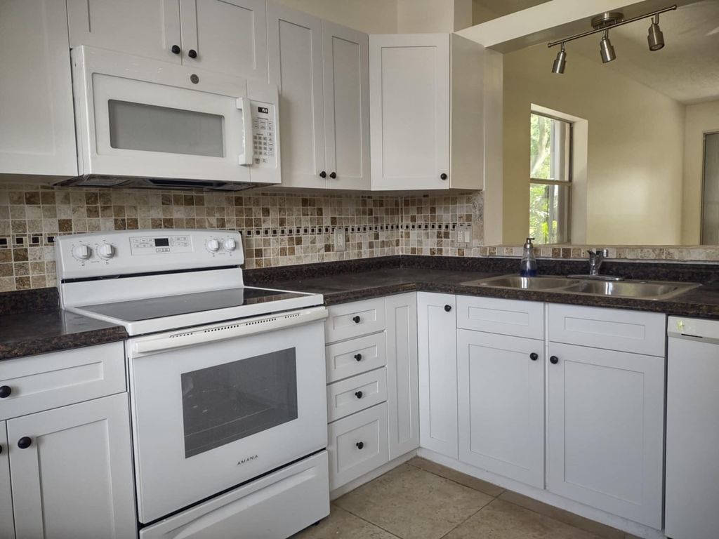 Photo of 18081 SE Country Club Drive #Apt 341, Jupiter, FL 33469 (MLS # B26018053)