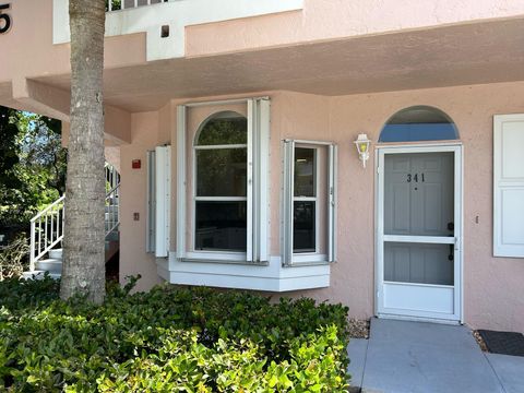 Photo of 18081 SE Country Club Drive #Apt 341, Jupiter, FL 33469 (MLS # B26018053)