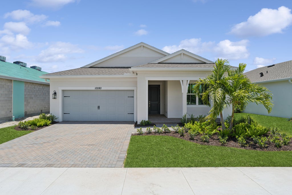 Photo of 10080 NW Field Flower Trail, Port Saint Lucie, FL 34987 (MLS # B26026341)