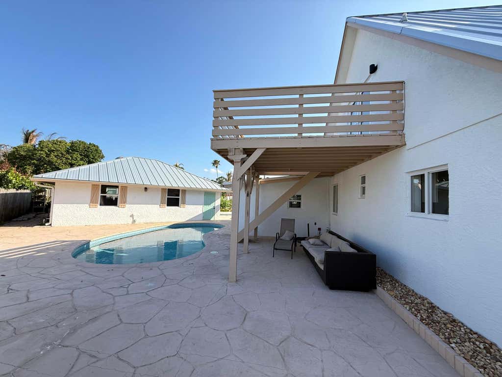 Photo of 5814 SE ORANGE BLOSSOM Trail #A, Hobe Sound, FL 33455 (MLS # B26068903)