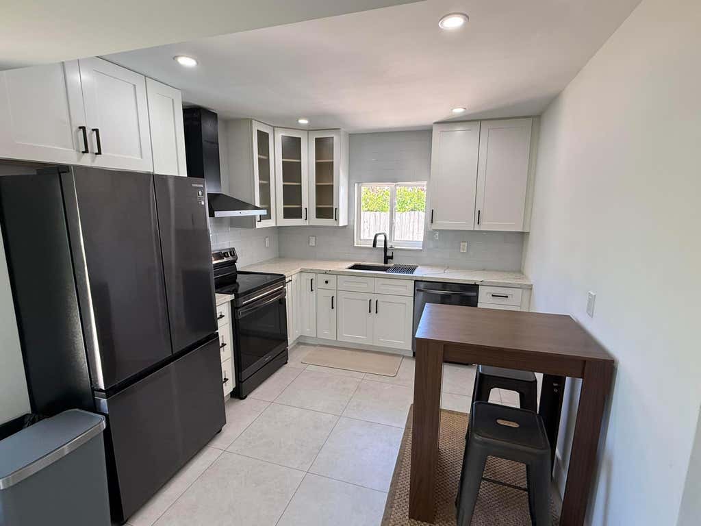Photo of 5814 SE ORANGE BLOSSOM Trail #A, Hobe Sound, FL 33455 (MLS # B26068903)