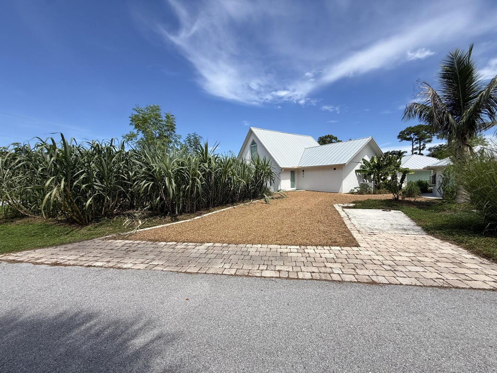Photo of 5814 SE ORANGE BLOSSOM Trail #A, Hobe Sound, FL 33455 (MLS # B26068903)