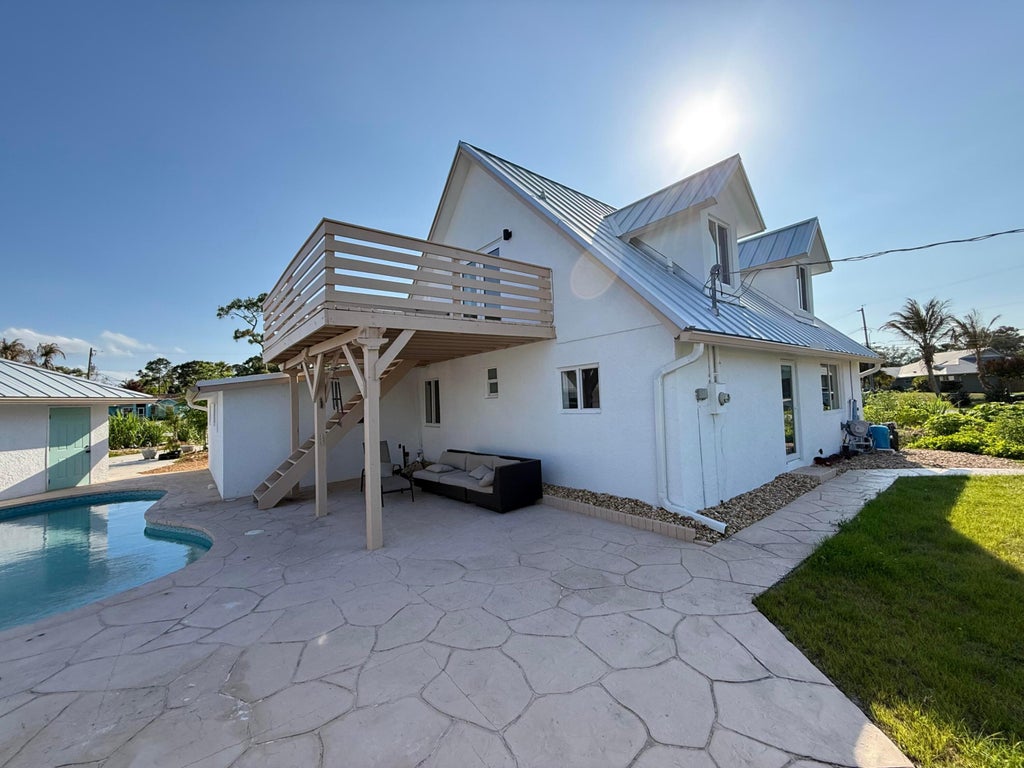 Photo of 5814 SE ORANGE BLOSSOM Trail #A, Hobe Sound, FL 33455 (MLS # B26068903)