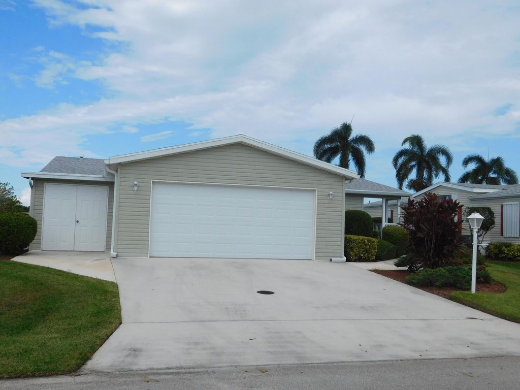 Photo of 8044 Long Drive, Port Saint Lucie, FL 34952 (MLS # R10918356)