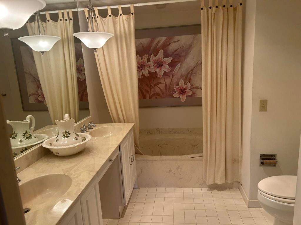 Photo of 11370 Twelve Oaks Way #117, North Palm Beach, FL 33408 (MLS # R11082339)