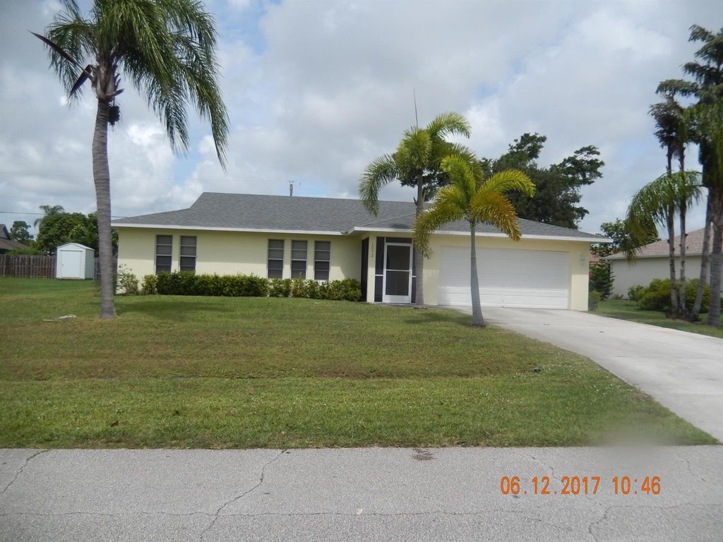 Photo of 1972 SE Camilo Street, Port St Lucie, FL 34952 (MLS # R11051380)