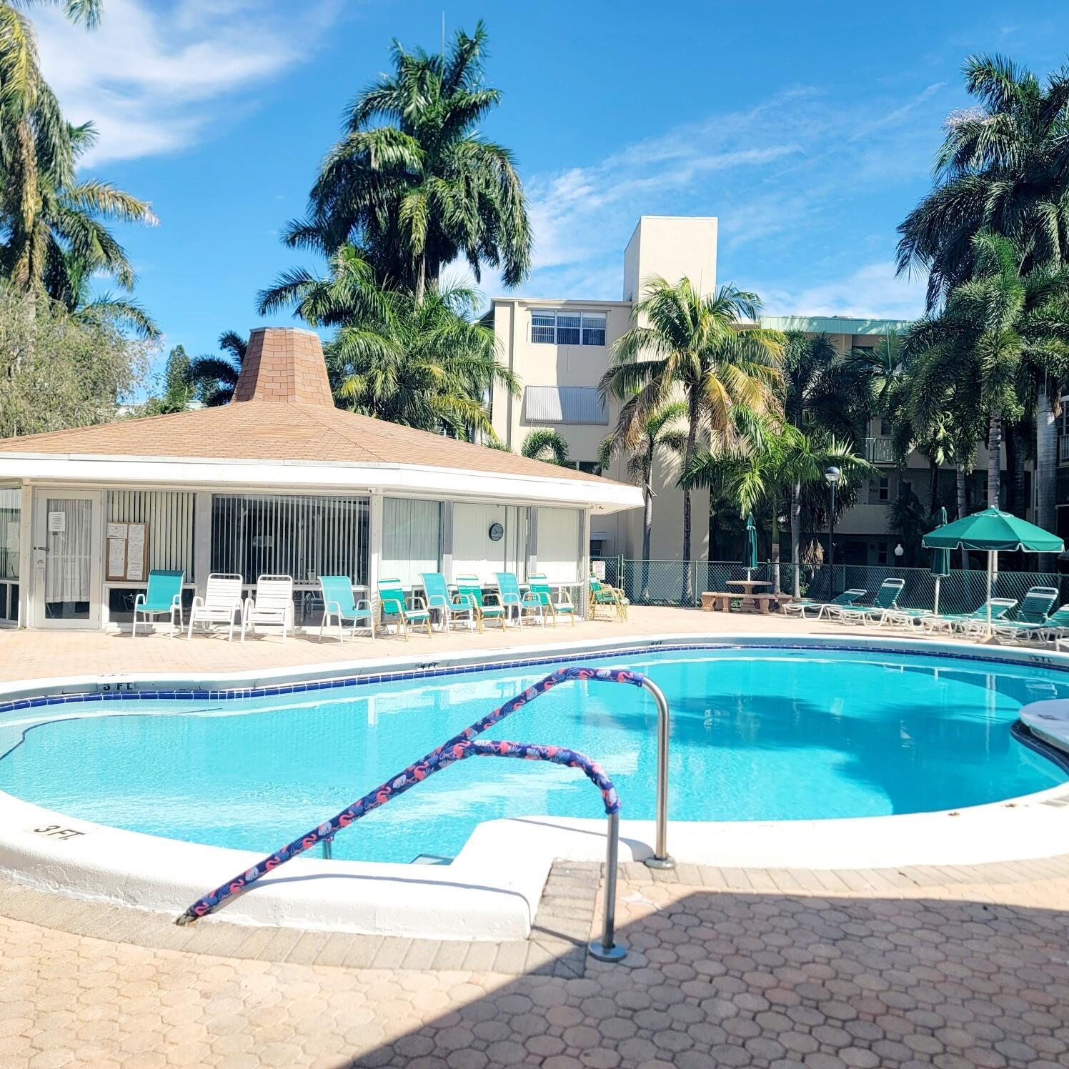 ALL AGES!!!! BEAUTIFUL 1/1, FIRST FLOOR, PARKING IN FRONT OF THE DOOR, CERAMIC TILE FLOORS THROUGHOUT, ENCLOSED PATIO WITH A BACK DOOR TO GO TO THE POOL AND CLUB AREA. CLOSE TO GULFSTREAM VILLAGE, SHOPPING AND RESTAURANTS.