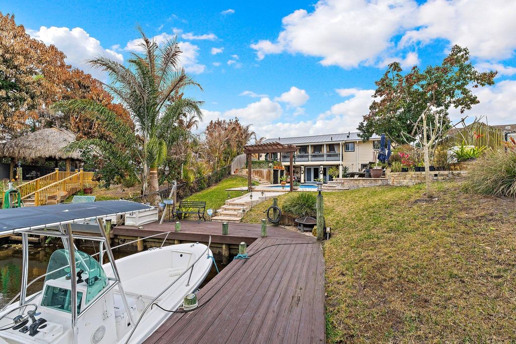 Photo of 1430 SW Covered Bridge Drive, Palm City, FL 34990 (MLS # R11165486)