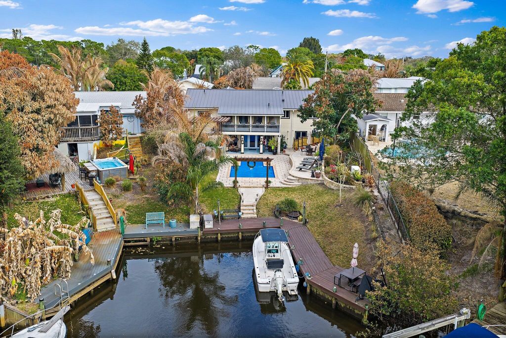 Photo of 1430 SW Covered Bridge Drive, Palm City, FL 34990 (MLS # R11165486)