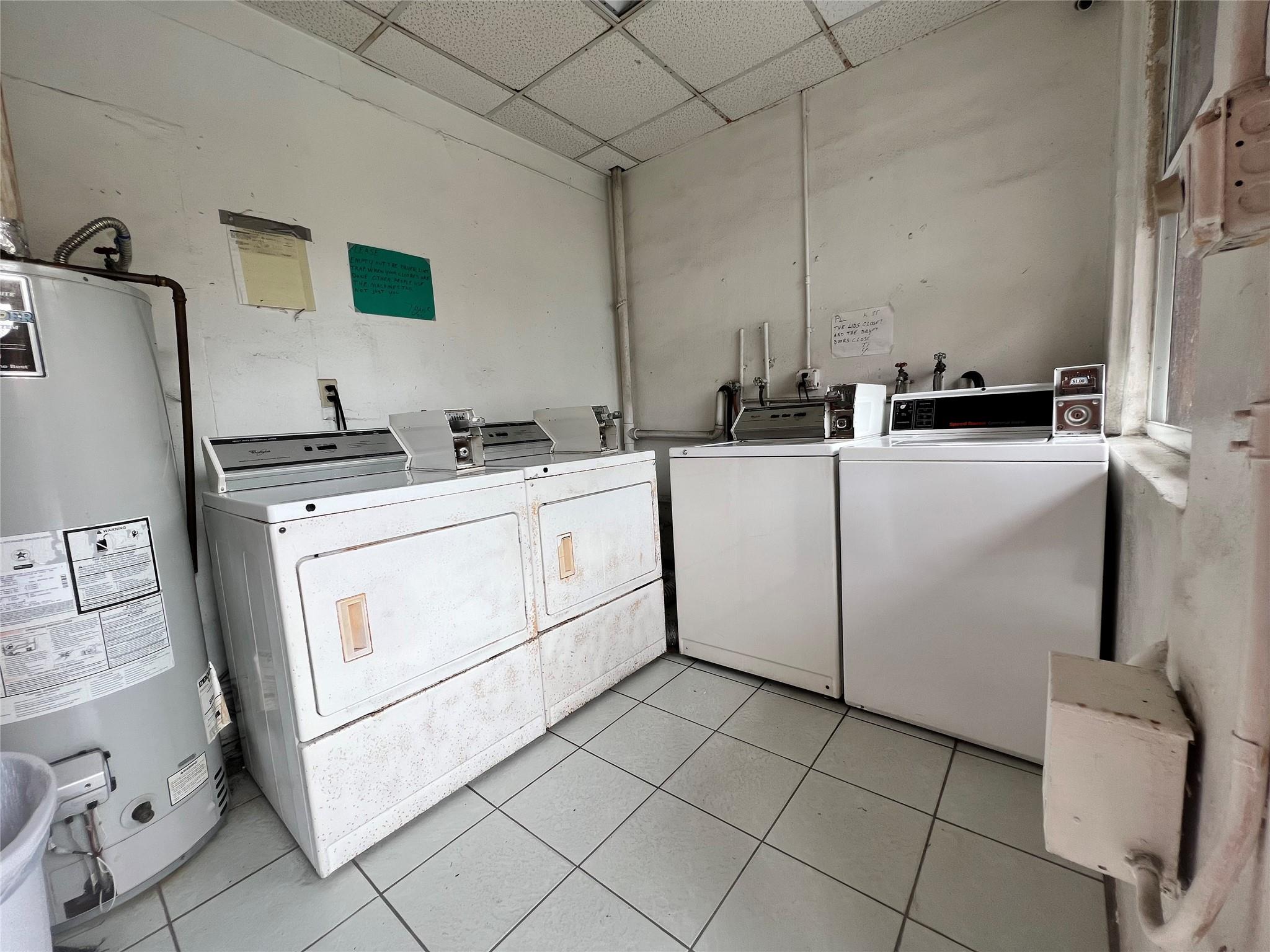 Cozy and bright studio apartment located in the heart of Hollywood, FL! Featuring gleaming hardwood floors and a functional layout, this unit offers a separate kitchen with modern cabinetry, full-size refrigerator, and ample storage space. The living area boasts natural light through large windows with charming views. The retro-inspired bathroom is well-maintained with colorful tile accents. Additional highlights include built-in air conditioning and a mirrored wall for an open feel. Conveniently located near shopping, dining, and entertainment, this apartment is perfect for urban living. Pets welcome, no aggressive breeds.