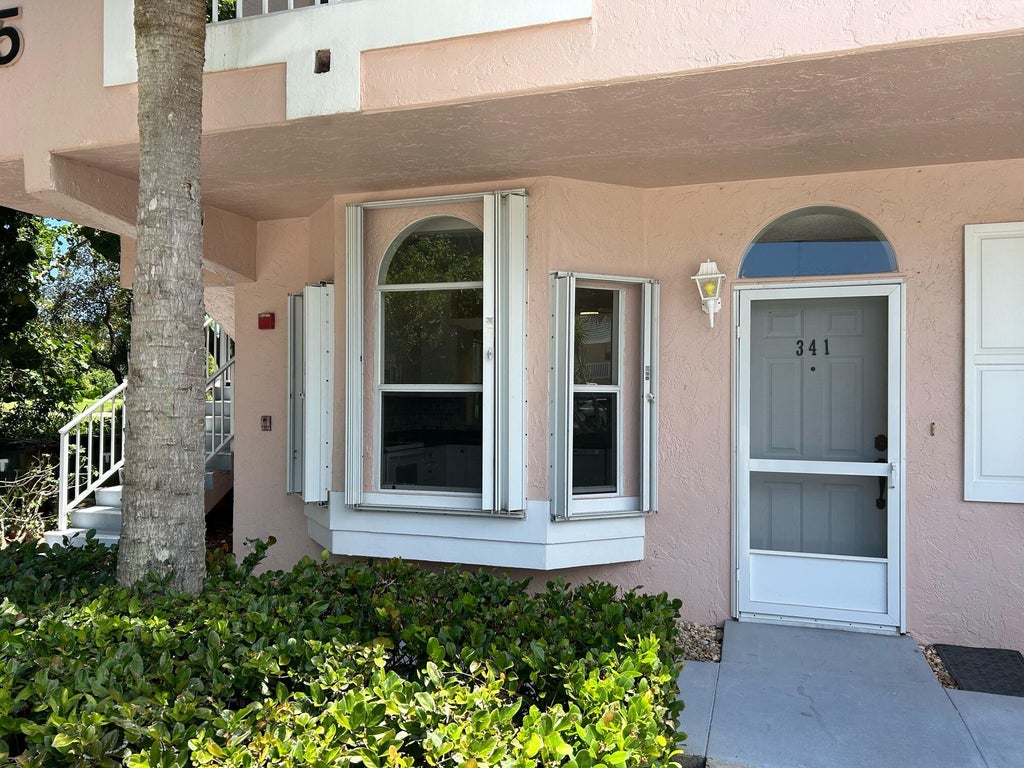 Photo of 18081 SE Country Club Drive #Bldg.35, 341, Tequesta, FL 33469 (MLS # R11016992)