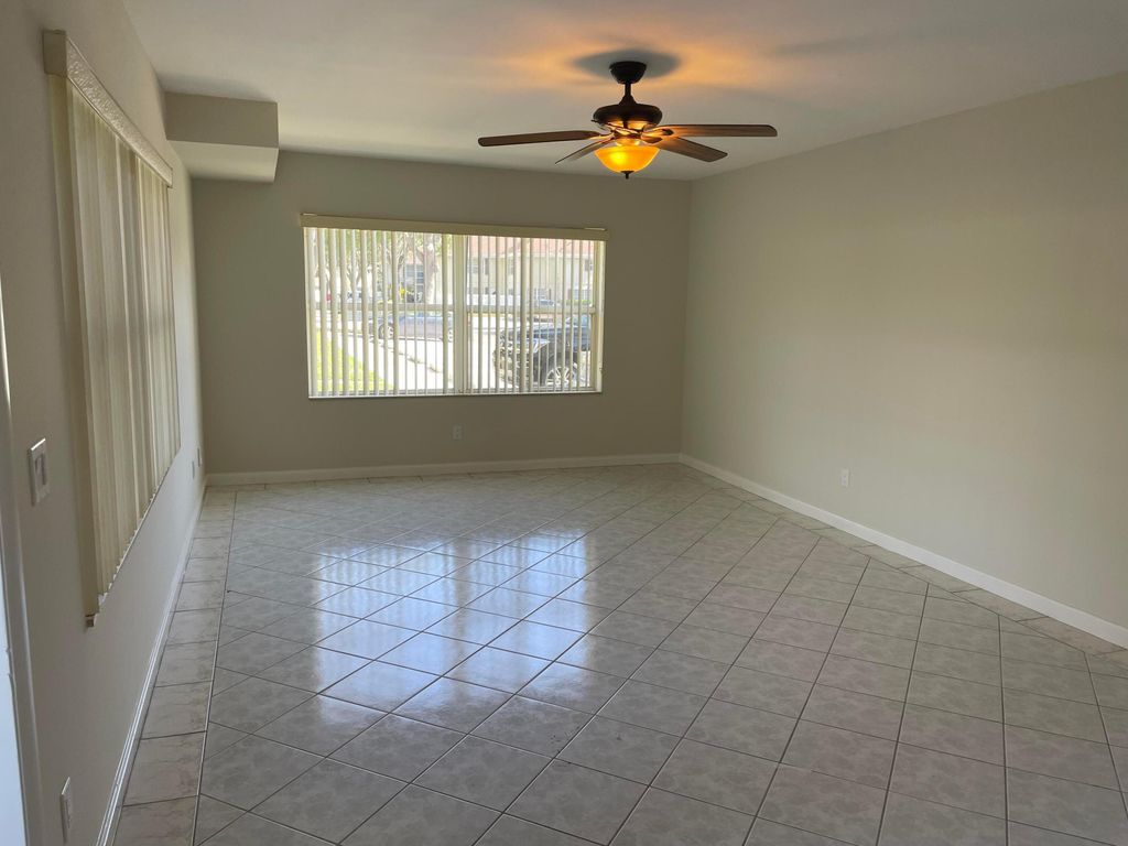 Photo of 43 Essex Court #A, Royal Palm Beach, FL 33411 (MLS # B26020041)