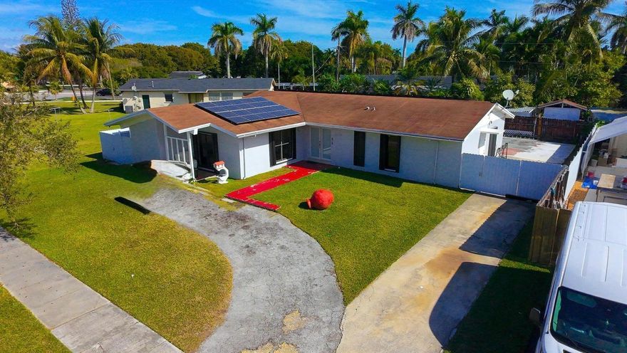 NO HOA!! LOW PROPERTIES TAXES Spacious and versatile 4-bedroom, 2-bathroom home featuring an additional flex room that can be used as a 5th bedroom, office, or guest space. The layout offers excellent potential for multi-generational living or flexible use to suit a variety of needs.
The large backyard provides ample space for a future pool, outdoor kitchen, or customized entertainment area, enhancing both functionality and outdoor enjoyment.

Solar panels contribute to energy efficiency and reduced utility expenses. The property also offers generous parking capacity, including space for multiple vehicles and room for a boat, RV, or trailer (subject to buyer verification). Located in a private cul-de-sac setting, this home combines space, flexibility, and long-term value in a desirable South Florida location