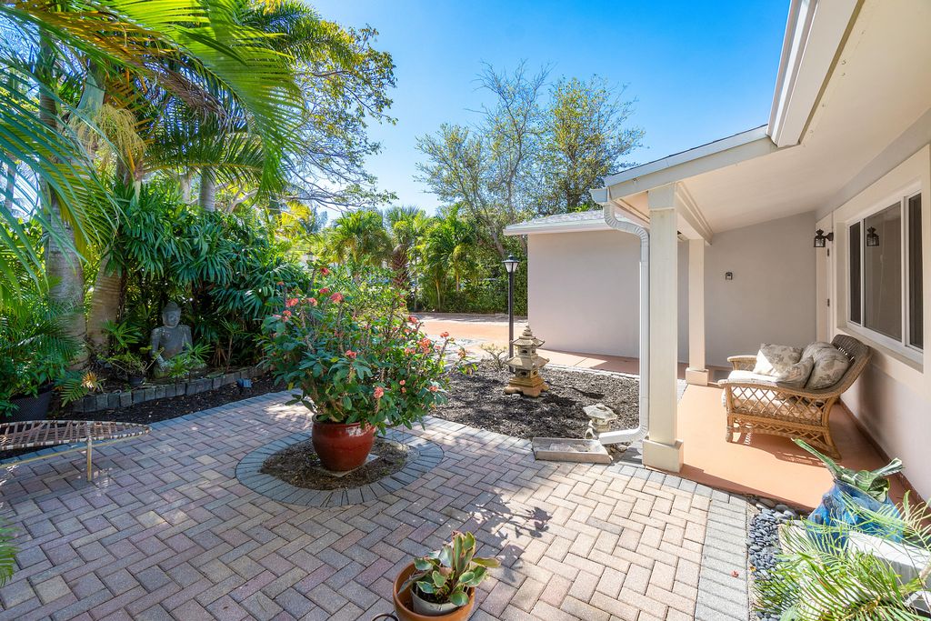 Photo of 1865 Pleasant Drive, Juno Beach, FL 33408 (MLS # R10962215)