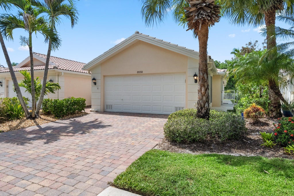 Photo of 8558 SE Retreat Drive, Hobe Sound, FL 33455 (MLS # B26019807)