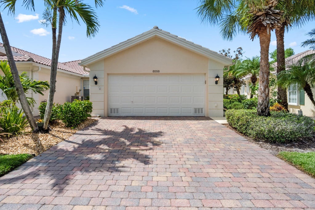 Photo of 8558 SE Retreat Drive, Hobe Sound, FL 33455 (MLS # B26019807)
