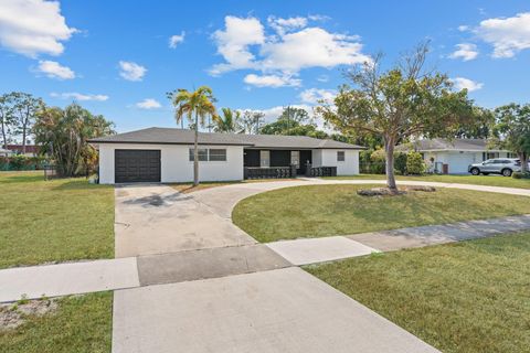 Photo of 7328 Saint Andrews Road, Lake Worth, FL 33467 (MLS # F10552724)