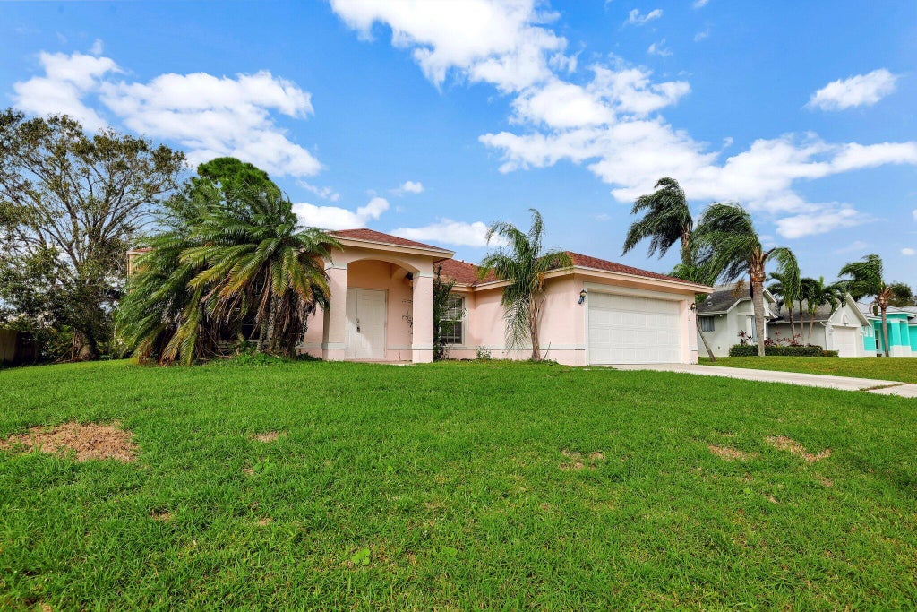 Photo of 2018 SW Capeador Street, Port Saint Lucie, FL 34983 (MLS # R11033984)