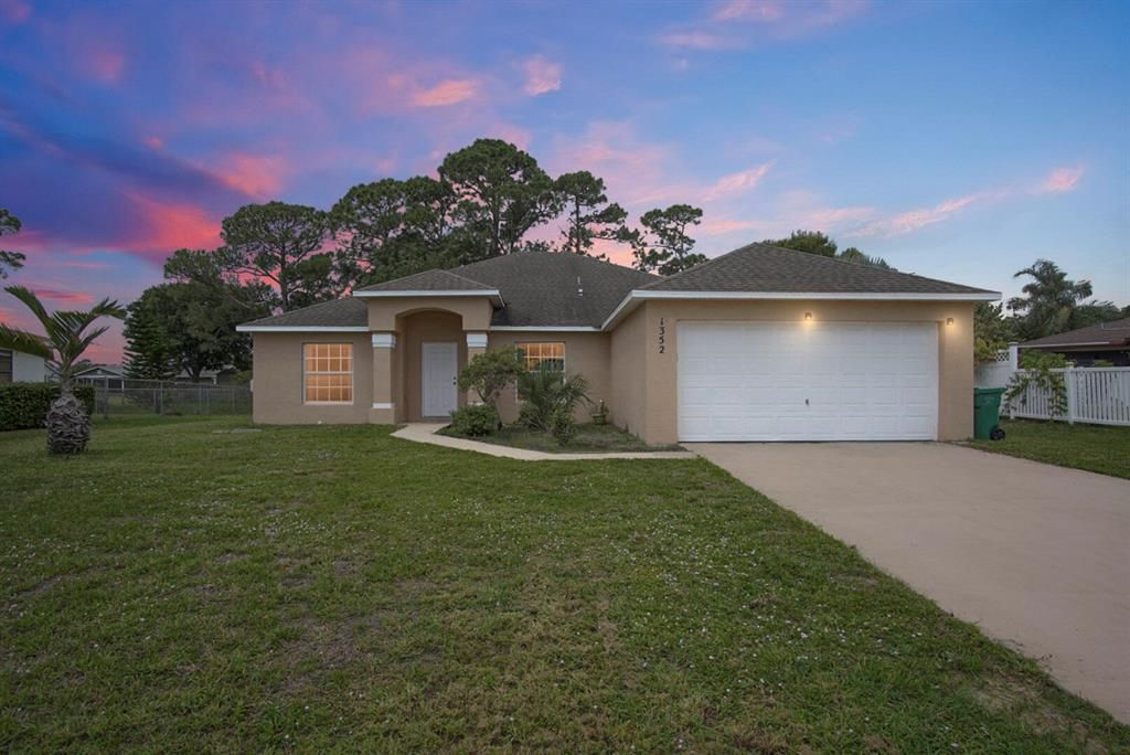 Photo of 1352 SE Manth Lane, Port St Lucie, FL 34983 (MLS # R10887747)