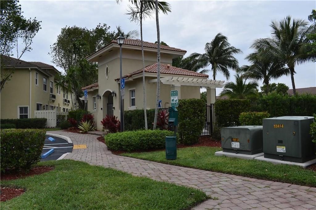 Photo of 2851 W Prospect Road #1211, Tamarac, FL 33309 (MLS # B26030170)