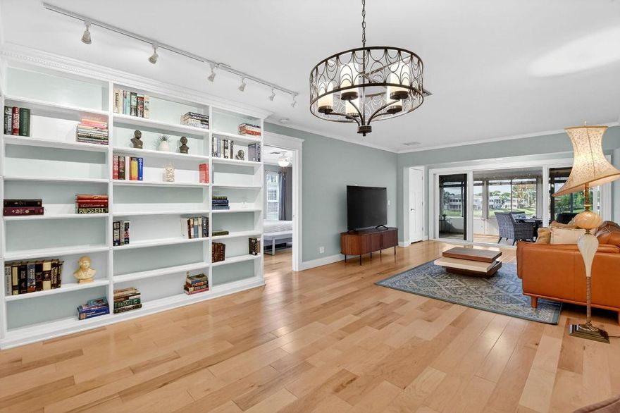 Welcome to this beautifully updated second-floor condo in Pines of Delray West. This is a CORNER unit offering plenty of natural light throughout the condo. Enjoy truly stunning lake views from the living room and spacious primary bedroom, all framed by hurricane-impact windows for year-round peace of mind. The home features a renovated kitchen and bathrooms, an eat-in kitchen with stainless steel appliances, and wood flooring throughout. A custom built-in in the dining area adds both charm and functionality. This 55+ condo has a low monthly HOA, and convenient proximity to Delray's pristine beaches, local shops and restaurants; perfect blend of comfort, convenience, and coastal living.