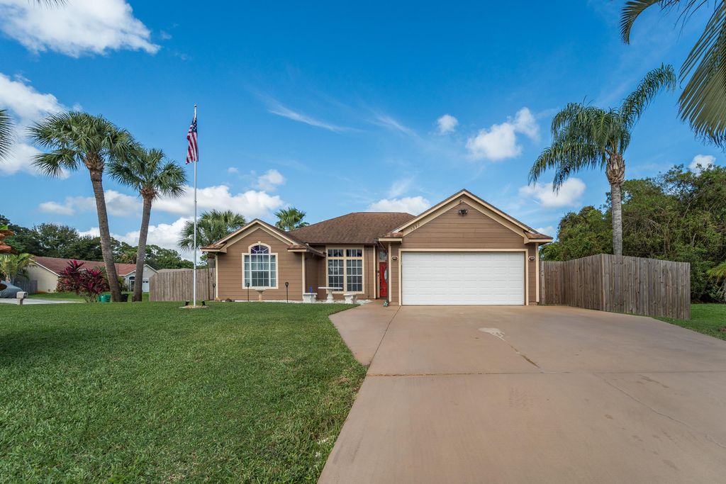 Photo of 1397 SW Lawndale Avenue, Port Saint Lucie, FL 34953 (MLS # R11035808)