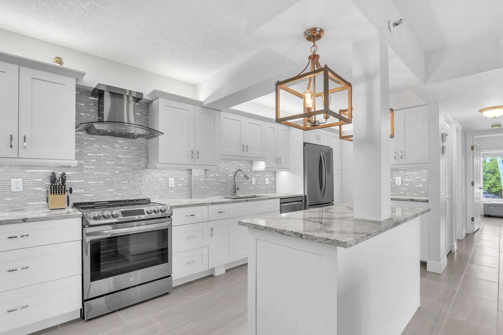 Photo of 4444 NE Ocean Boulevard #E2, Jensen Beach, FL 34957 (MLS # R11123129)