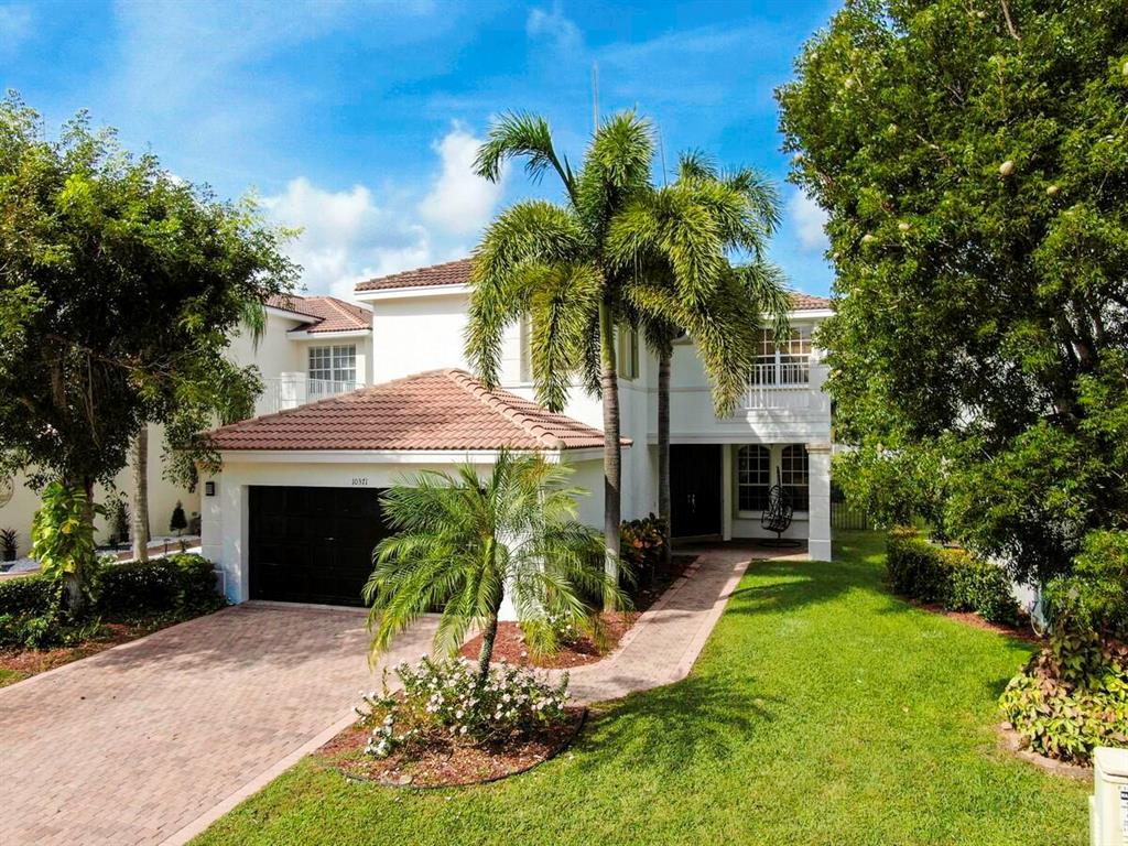 This stunning 4 bedrooms, 2.5 baths, home has a stunning lake view. Perfect floorplan to entertain with a formal living room, formal dining room, family room and a covered patio. Master retreat with a tray ceiling, his and hers walk-in closets, soaking tub , walk-in shower and dual sinks. This home boasts crown molding, neutral flooring and is move in ready. The large covered patio overlooks the private yard. Canyon Lakes features first class amenities that include a clubhouse with fitness center, resort style pool, tot water play area, tennis courts, basketball court and tot play areas. Located close to shopping, restaurants, A rated schools and the beach.