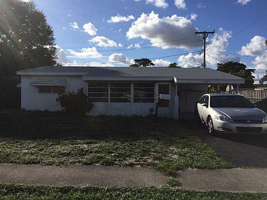 Imagine putting your personal stamp on this meticulously maintained 1957 adorable home. Sit on your front glass porch & watch the world go by. This yard is large enough for a pool  & patio. There is a family room & an interior laundry room plus an additio nal workshop/workroom/office. Refinish the terrazzo floors & they will shine like glass. This home is located within a safe & quiet neighborhood close to I95, shopping, & restaurants. Finance buyers must be pre-approved by Sondra Dane at Supreme Lending.