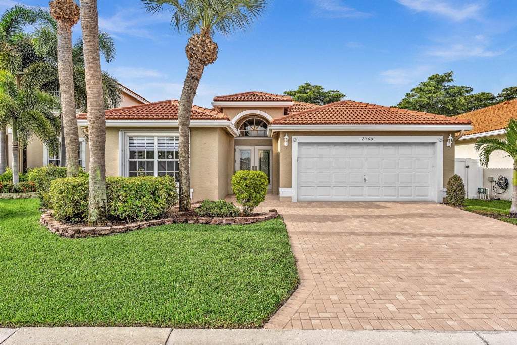 Photo of 3760 Newport Avenue, Boynton Beach, FL 33436 (MLS # B26064200)