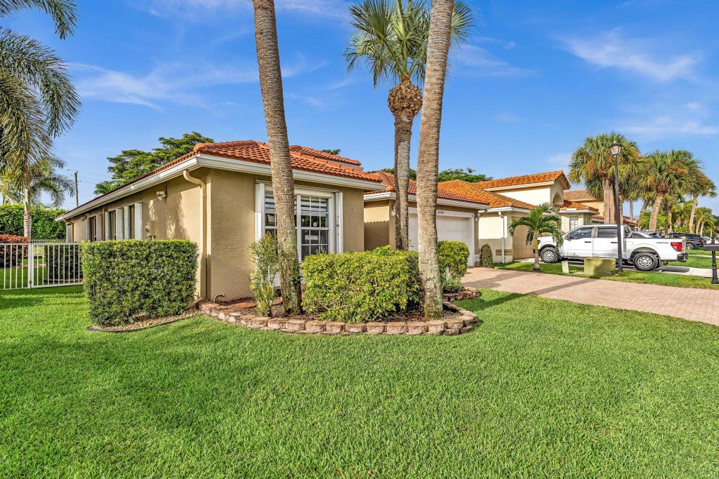 Photo of 3760 Newport Avenue, Boynton Beach, FL 33436 (MLS # B26064200)