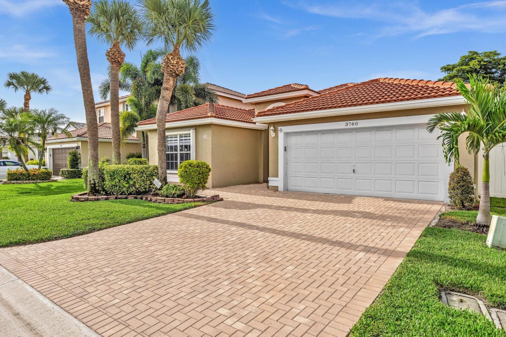 Photo of 3760 Newport Avenue, Boynton Beach, FL 33436 (MLS # B26064200)
