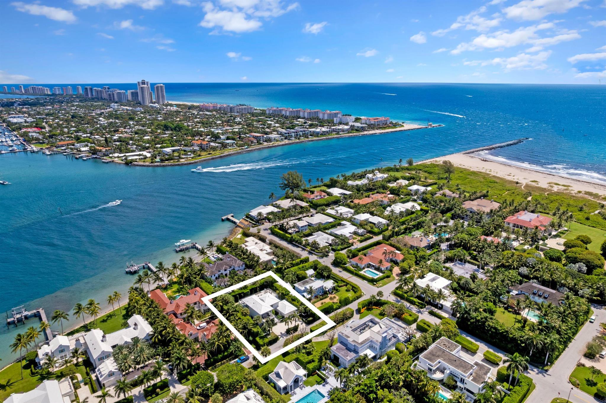 Discover a modern masterpiece nestled in the serene north-end of Palm Beach. This smart 5-bedroom, 5.1-bathroom residence, recently reimagined by Todd Michael Glazer, offers over 7,000 SF featuring the perfect blend of luxury and functionality. Step inside to find high ceilings and floor-to-ceiling windows that fill the interior with natural light. A stunning floating staircase and a new gourmet eat-in kitchen with sleek finishes set a sophisticated tone. The large primary suite provides a luxurious retreat with access to two terraces. Entertainment is a breeze with a stylish glass railing upper deck offering captivating island views. This home also includes a two-car (air-conditioned) garage, new impact windows / doors, a newer roof, and meticulously manicured landscaping.