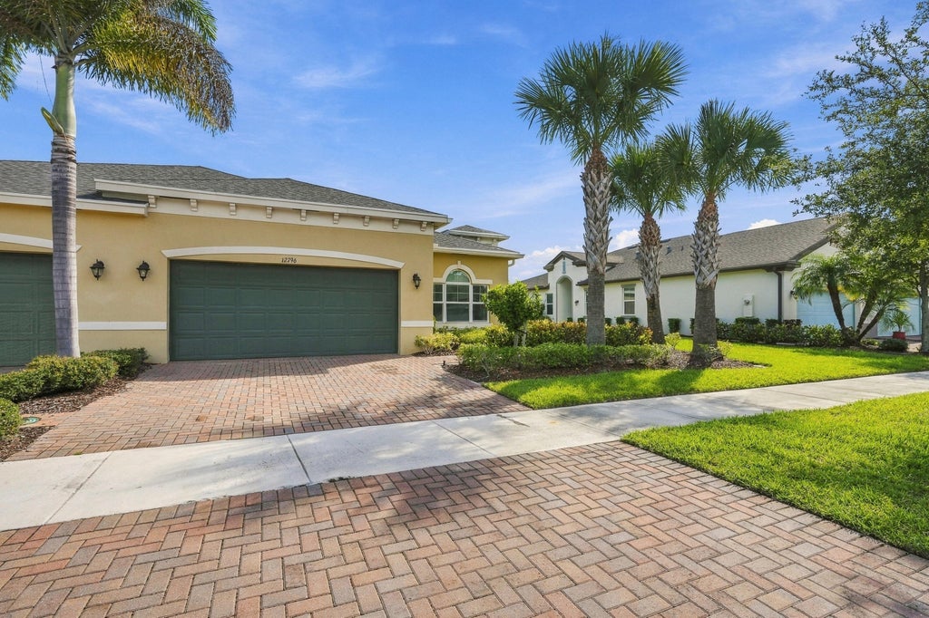 Photo of 12796 SW Lake Fern Circle, Port Saint Lucie, FL 34987 (MLS # B26079664)