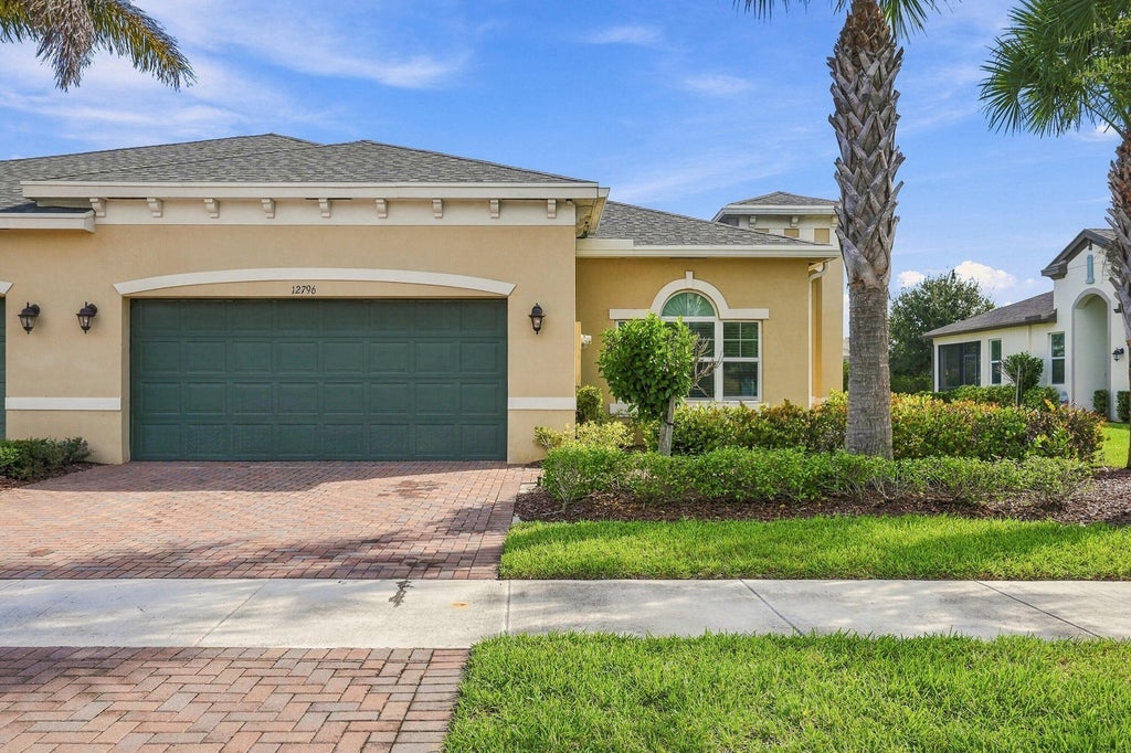 Photo of 12796 SW Lake Fern Circle, Port Saint Lucie, FL 34987 (MLS # B26079664)