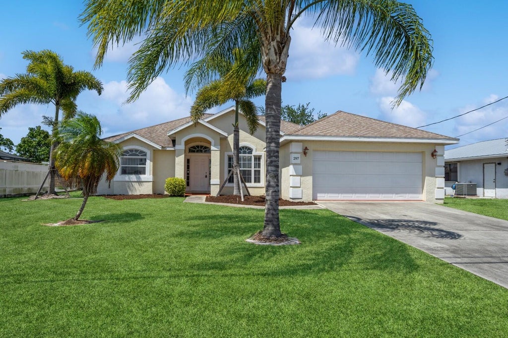 Photo of 297 SW Whitmore Drive, Port Saint Lucie, FL 34984 (MLS # R10989106)