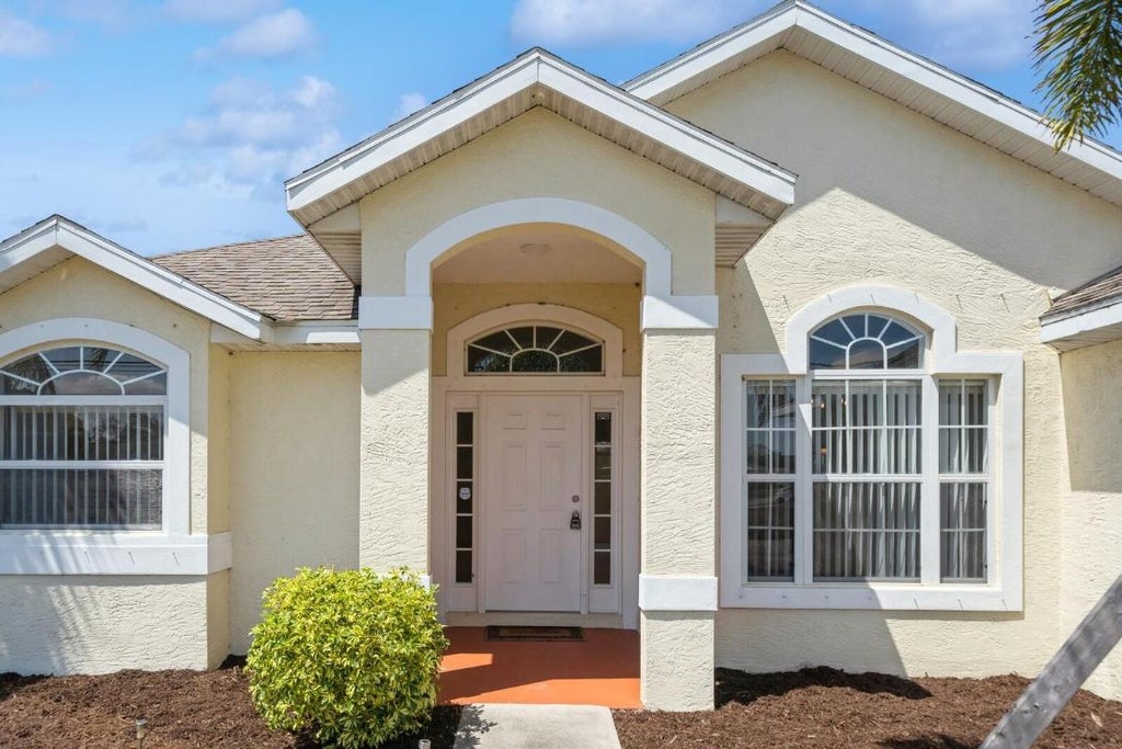 Photo of 297 SW Whitmore Drive, Port Saint Lucie, FL 34984 (MLS # R10989106)