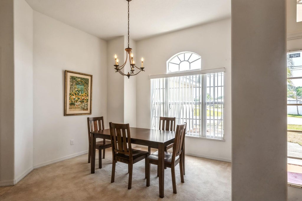 Photo of 297 SW Whitmore Drive, Port Saint Lucie, FL 34984 (MLS # R10989106)