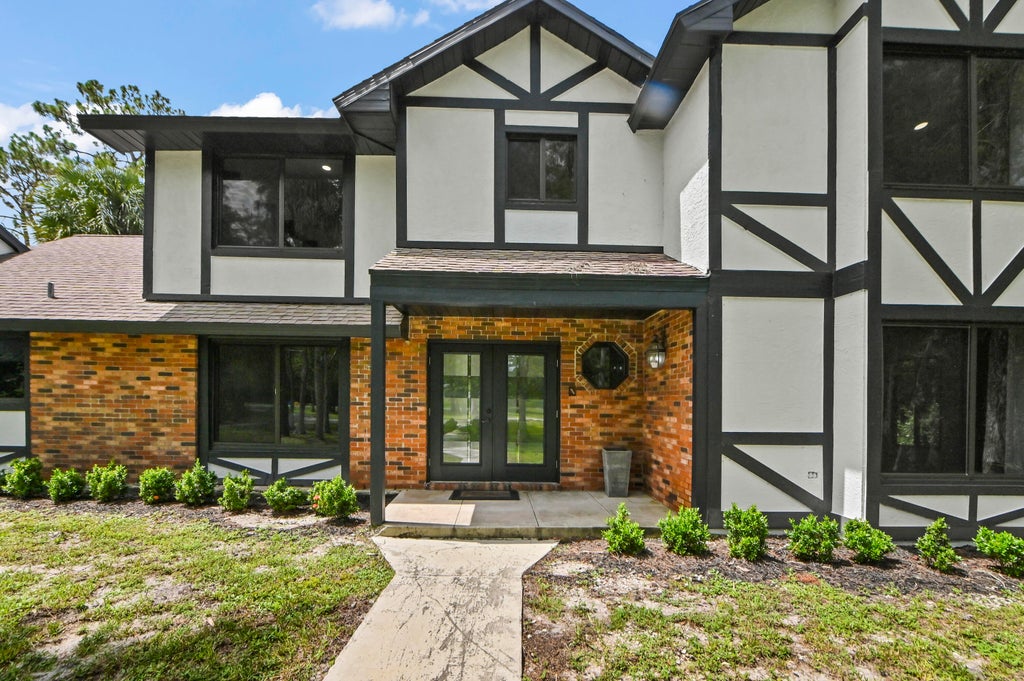 Photo of 12986 Marcella Boulevard, Loxahatchee Groves, FL 33470 (MLS # B26056153)