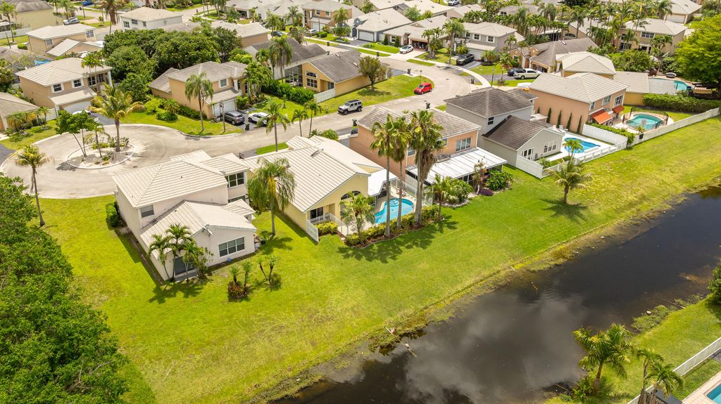 Photo of 5535 NW 54th Circle, Coconut Creek, FL 33073 (MLS # B26021103)