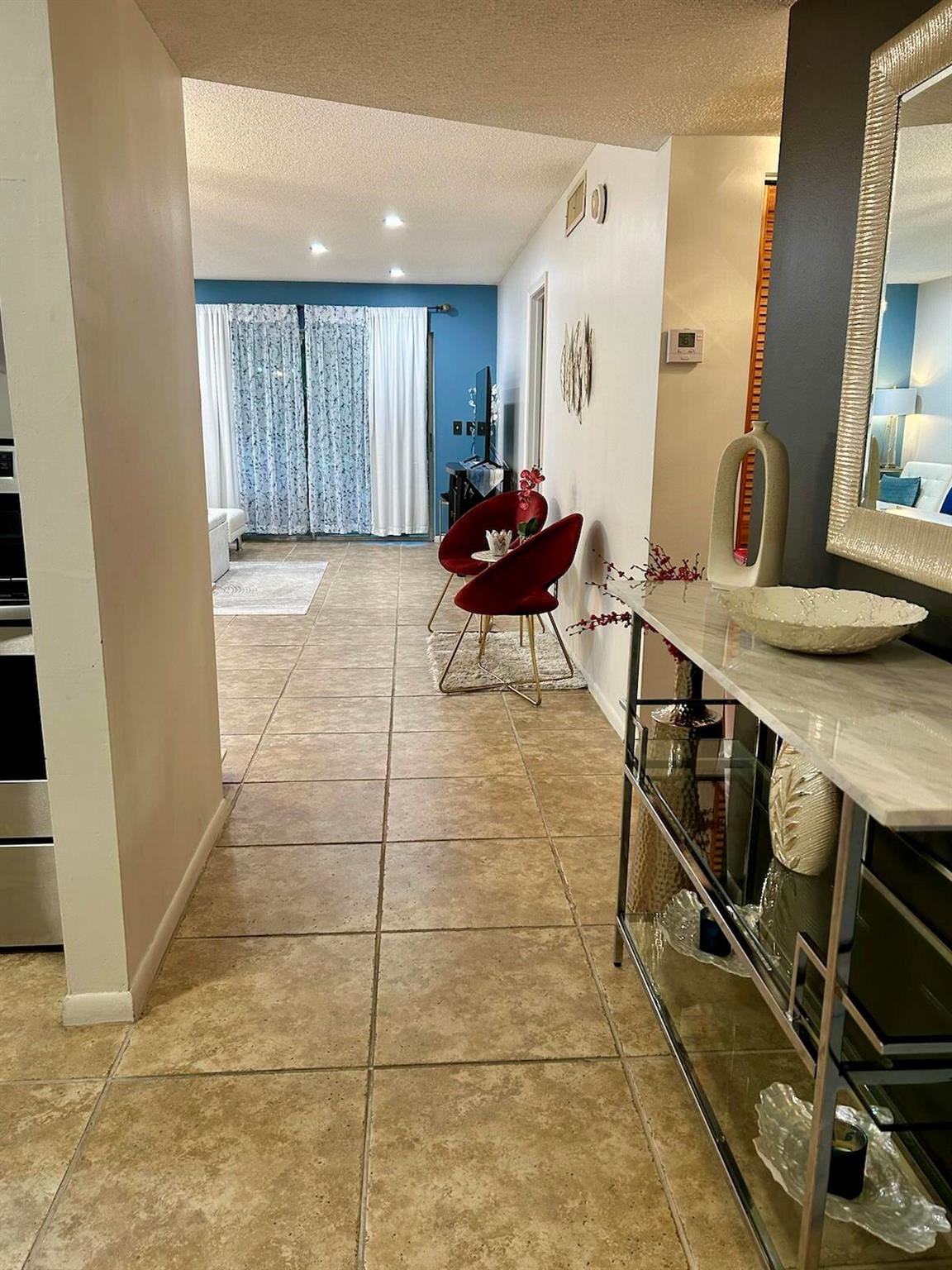 Spacious 2BR/2BA second-floor condo - all ages welcome. Completely renovated. Available furnished, partially furnished, or unfurnished. Ideal for corporate tenants or families, located in an area with top-rated schools. Enjoy beautiful lake views. While the community laundry is just steps away, the unit is also washer/dryer hook-up ready. Roll-down shutter protection included.Located in Lago Del Rey, just west of I-95 between Linton and Atlantic - prime Delray Beach location! Community offers pools, tennis, gym, and clubhouse.Water is included in the rent.Flexible lease terms: 6 to 12 months available.Note: Storage unit not included.Incentive: Application fee will be reimbursed upon approval.Subleasing is strictly prohibited.