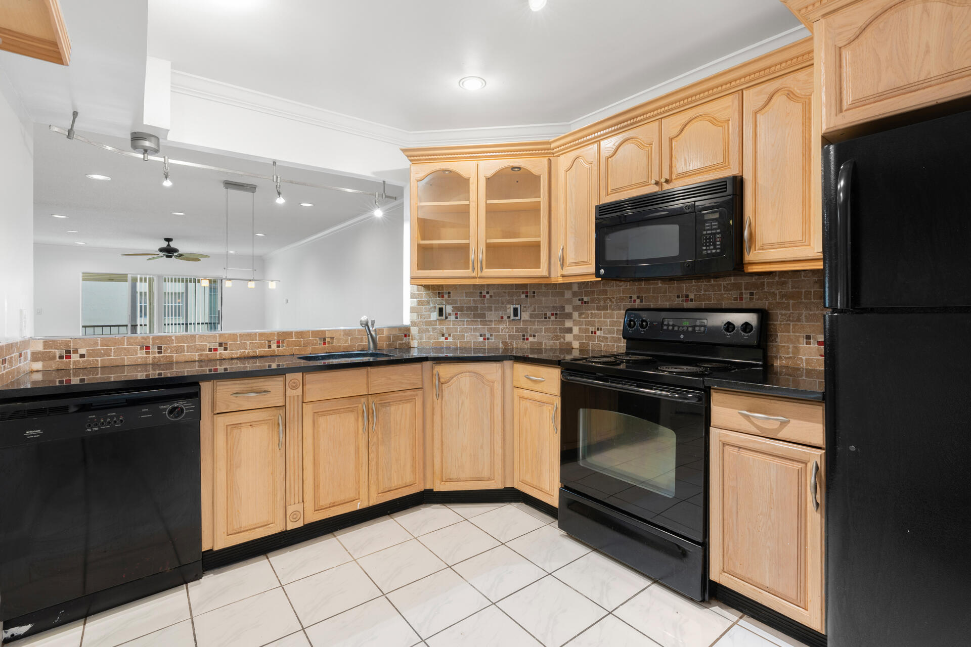 Falls of Inverrary - 2/2 Rental. Spacious condo featuring tile floors throughout, two large closets, and a big balcony. Gated community with 24-hour security, pool, playground, walking trail, and more. Rent includes water, trash, and pest control.Close to Turnpike, Sawgrass Expressway, Sawgrass Mills Mall, Publix, and Walmart. Association requires minimum $55K annual income and 675 credit score. All ages welcome. Vacant and easy to show.
