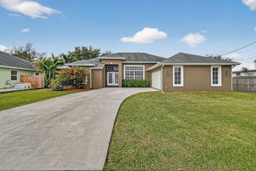Photo of 3960 SW Hablow Street, Port Saint Lucie, FL 34953 (MLS # R11141893)
