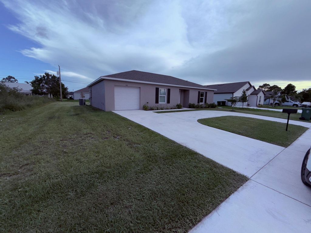 Photo of 316 SW Becker Road, Port Saint Lucie, FL 34953 (MLS # R11101088)