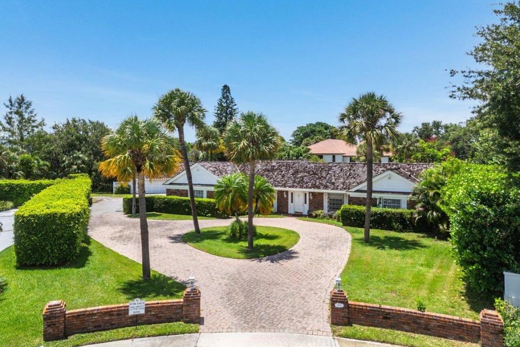 Photo of 11991 Lake Shore Place, North Palm Beach, FL 33408 (MLS # R11102965)
