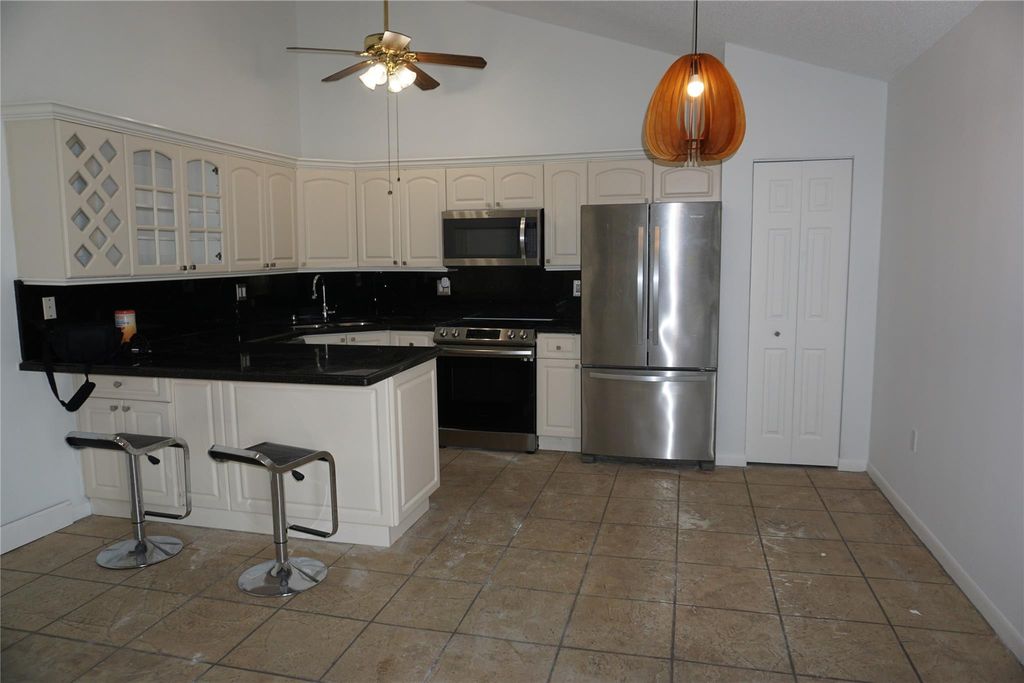 Photo of 9830 Boca Gardens Trail #B, Boca Raton, FL 33496 (MLS # F10400208)