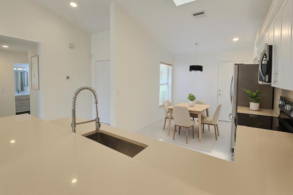 Photo of 5622 Royal Lake Circle, Boynton Beach, FL 33437 (MLS # R11119841)