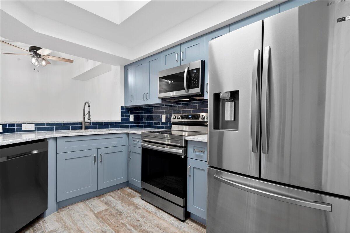Beautifully updated and upgraded two bedroom and one bathroom ground floor condo in San Matera. Newer appliances, including the laundry, upgraded floors, cabinets, countertops, custom trim, light fixtures and more. Walk out the door to enjoy a landscaped and peaceful green space or enjoy the views from the covered and screened patio space. San Matera is ideally located minutes from beaches, interstates and entertainment while maintaining a private resort feel when home or enjoying the impressive community amenities.