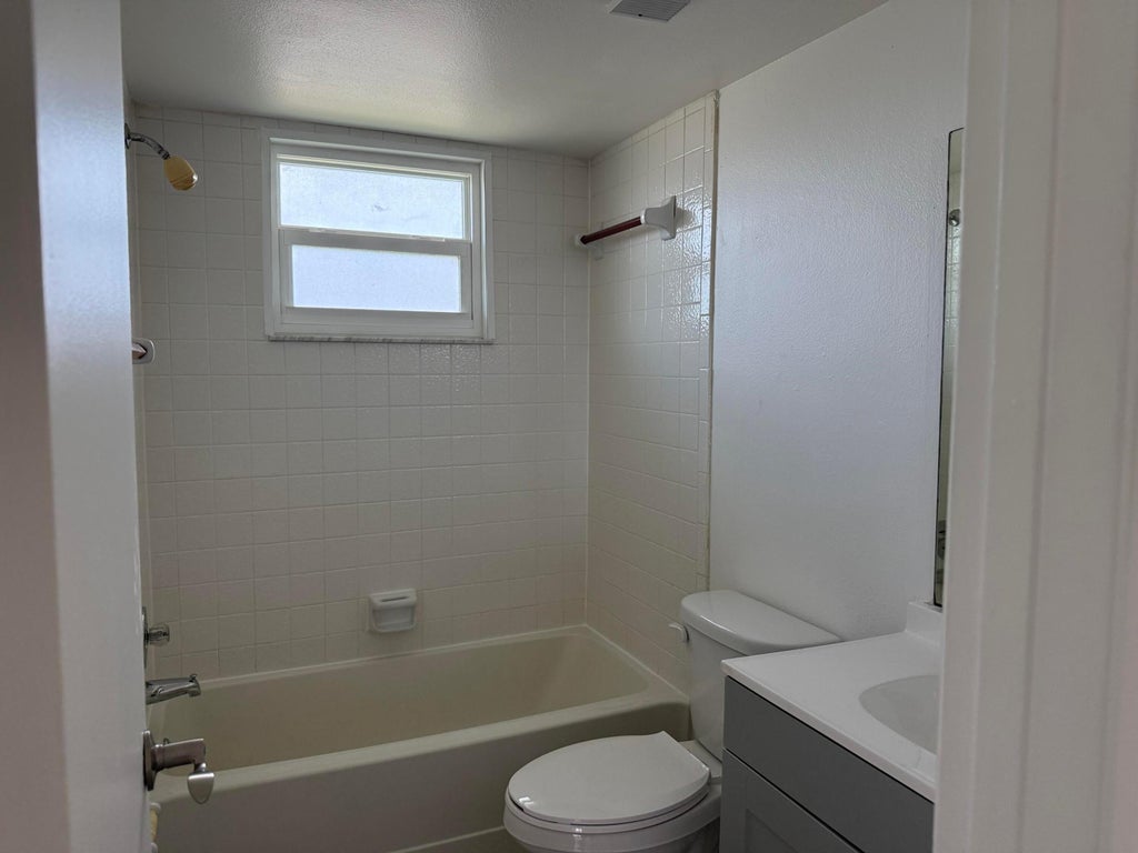 Photo of 1536 SE Royal Green CIR #201, Port Saint Lucie, FL 34952 (MLS # B26045685)