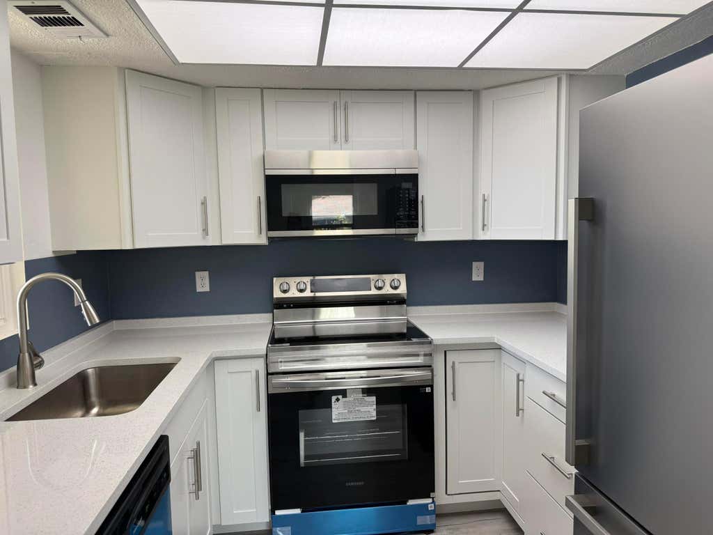 Photo of 1536 SE Royal Green CIR #201, Port Saint Lucie, FL 34952 (MLS # B26045685)